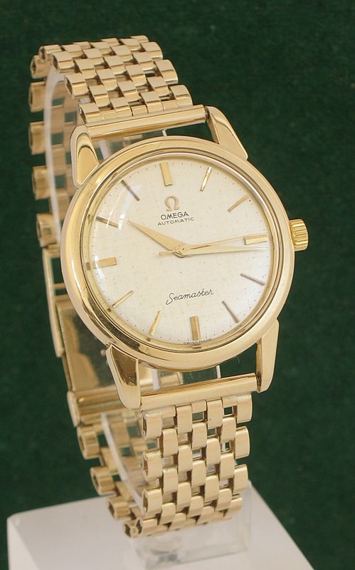 fig 1. SUPERB ORIGINAL SOLID 9CT GOLD OMEGA SEAMASTER AUTOMATIC MENS WATCH ON A SOLID 9CT GOLD BRACELET