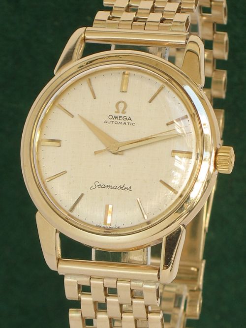 fig 2. SUPERB ORIGINAL SOLID 9CT GOLD OMEGA SEAMASTER AUTOMATIC MENS WATCH ON A SOLID 9CT GOLD BRACELET