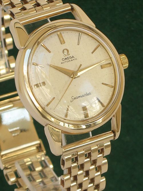 fig 3. SUPERB ORIGINAL SOLID 9CT GOLD OMEGA SEAMASTER AUTOMATIC MENS WATCH ON A SOLID 9CT GOLD BRACELET