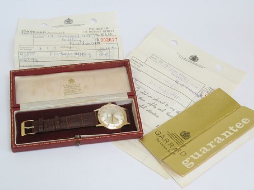 fig 4. OUTSTANDING SOLID 9CT GOLD GARRARD MENS WATCH WITH BOX AND PAPERS