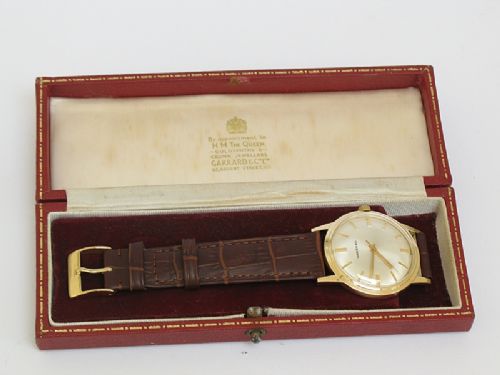 fig 5. OUTSTANDING SOLID 9CT GOLD GARRARD MENS WATCH WITH BOX AND PAPERS