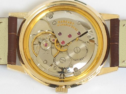 fig 8. OUTSTANDING SOLID 9CT GOLD GARRARD MENS WATCH WITH BOX AND PAPERS