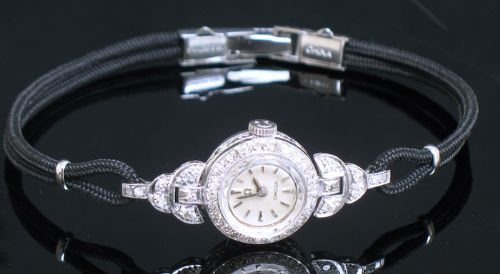 fig 5. WONDERFUL OMEGA PLATINUM AND DIAMOND LADIES COCKTAIL WATCH