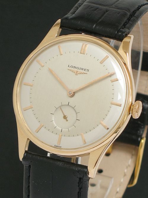fig 1. RARE SOLID 18CT ROSE GOLD LONGINES 27M MENS WATCH C1955