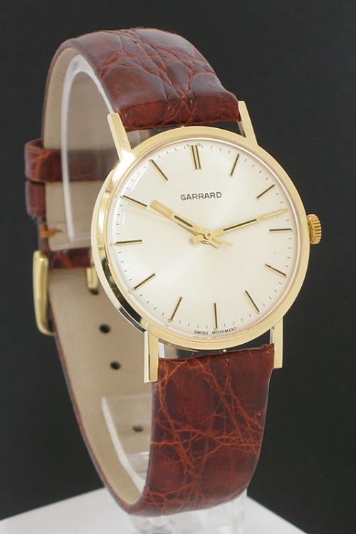 fig 1. SUPERB SOLID 9CT GOLD GARRARD MENS WATCH