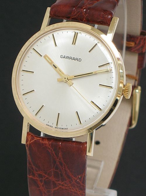 fig 2. SUPERB SOLID 9CT GOLD GARRARD MENS WATCH