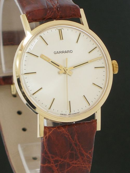 fig 3. SUPERB SOLID 9CT GOLD GARRARD MENS WATCH