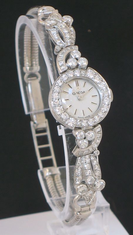 fig 1. EXCEPTIONAL UNIQUE OMEGA PLATINUM AND 3.5CT DIAMOND ART NOUVEAU LADIES COCKTAIL WATCH