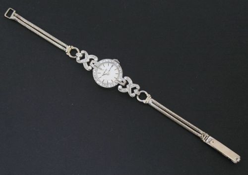 fig 3. BEAUTIFUL OMEGA PLATINUM AND DIAMOND LADIES COCKTAIL WATCH C1950