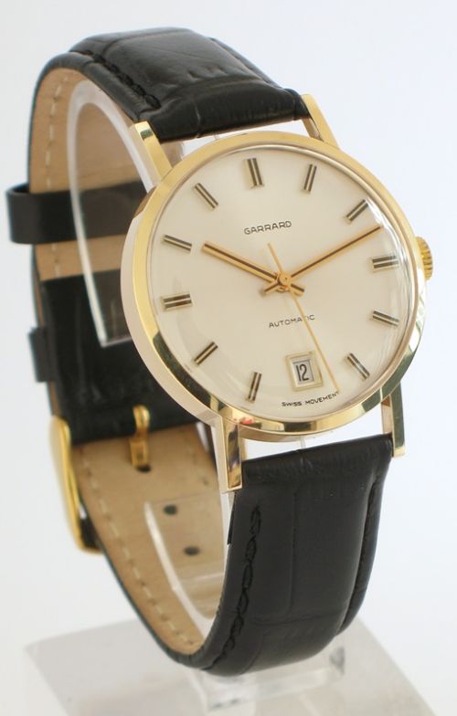 fig 1. STUNNING SOLID 9CT GOLD GARRARD AUTOMATIC MENS WATCH WITH BOX AND PAPERS