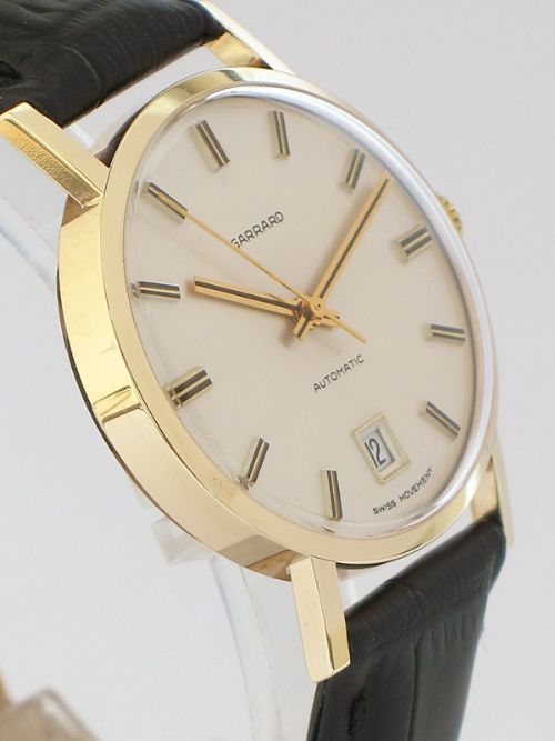 fig 4. STUNNING SOLID 9CT GOLD GARRARD AUTOMATIC MENS WATCH WITH BOX AND PAPERS