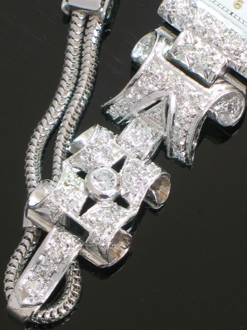 fig 5. UNIQUE OMEGA PLATINUM AND DIAMOND ART NOUVEAU LADIES COCKTAIL WATCH C1940