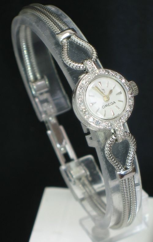 fig 1. DELIGHTFUL OMEGA PLATINUM AND DIAMOND LADIES VINTAGE COCKTAIL WATCH C1960