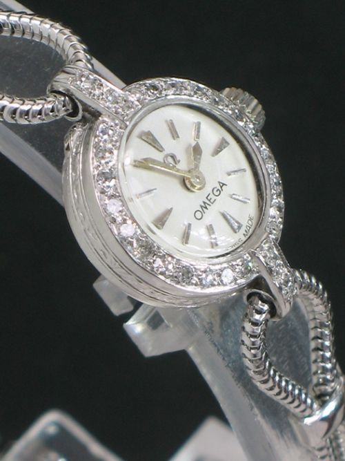 fig 5. DELIGHTFUL OMEGA PLATINUM AND DIAMOND LADIES VINTAGE COCKTAIL WATCH C1960