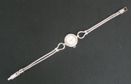 fig 6. DELIGHTFUL OMEGA PLATINUM AND DIAMOND LADIES VINTAGE COCKTAIL WATCH C1960