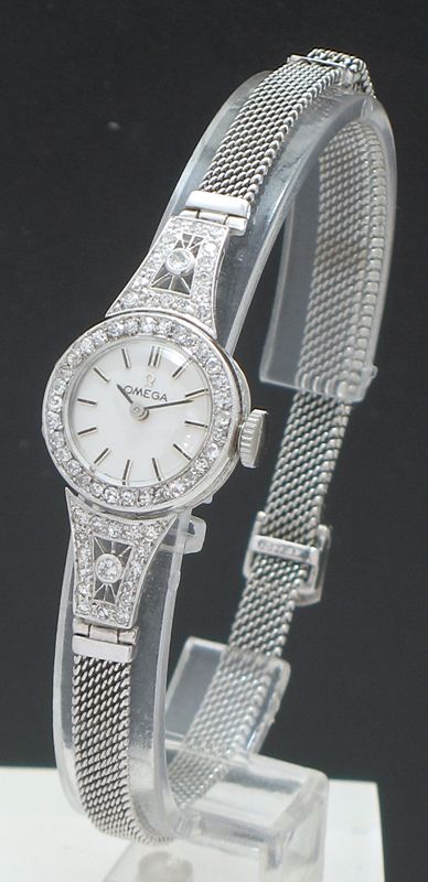 fig 1. BEAUTIFUL OMEGA PLATINUM AND DIAMOND LADIES COCKTAIL WATCH C1950