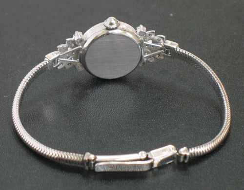 fig 6. STUNNING PLATINUM AND DIAMOND MOVADO LADIES COCKTAIL WATCH C1940