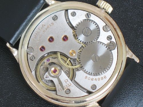 fig 6. WONDERFUL SOLID 9CT GOLD OMEGA CALIBRE 26.5 MENS VINTAGE WATCH C1944