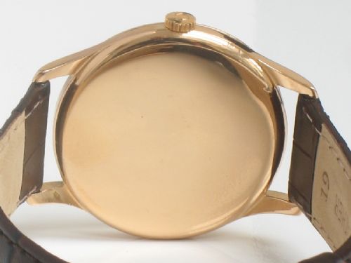 fig 6. RARE SOLID 18CT ROSE GOLD OVERSIZE OMEGA TRESOR CALIBRE 265 MENS WATCH C1948