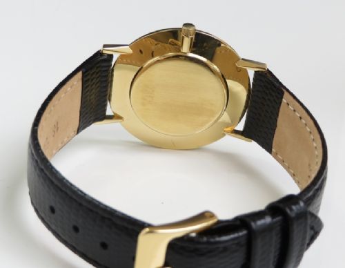 fig 3. SOLID 18CT GOLD UNIVERSAL GENEVE ULTRA SLIM DRESS WATCH C1964