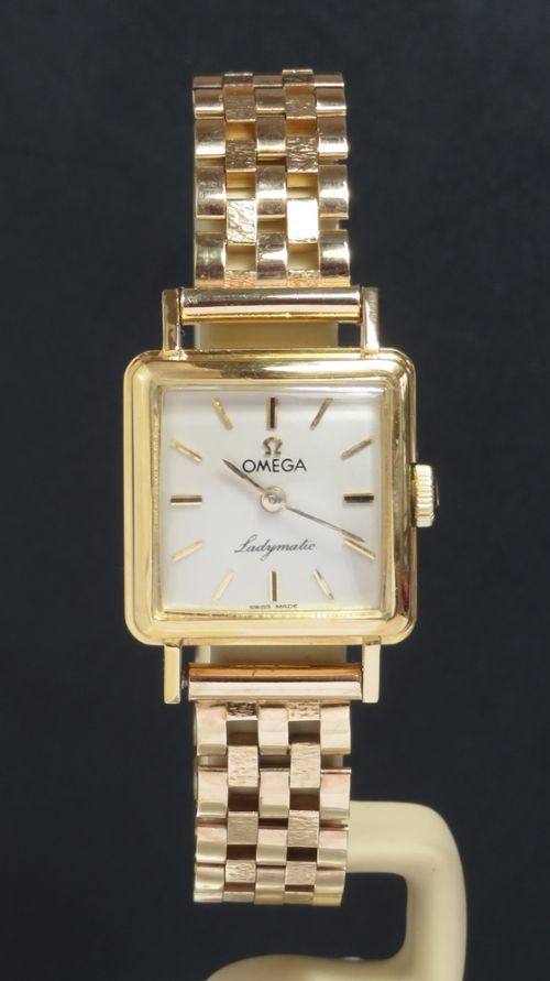fig 1. VERY RARE SOLID 18CT OMEGA LADYMATIC LADIES COCKTAIL WATCH WITH BOX AND PAPERWORK C1964