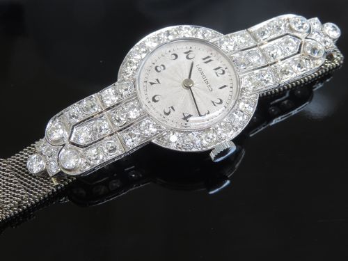 fig 4. INCREDIBLE LONGINES PLATINUM AND 5CTS OF DIAMONDS ART DECO LADIES COCKTAIL WATCH RETAILED BY HARRODS OF LONDON C1940