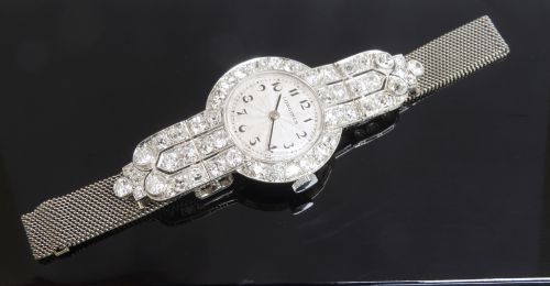 fig 5. INCREDIBLE LONGINES PLATINUM AND 5CTS OF DIAMONDS ART DECO LADIES COCKTAIL WATCH RETAILED BY HARRODS OF LONDON C1940