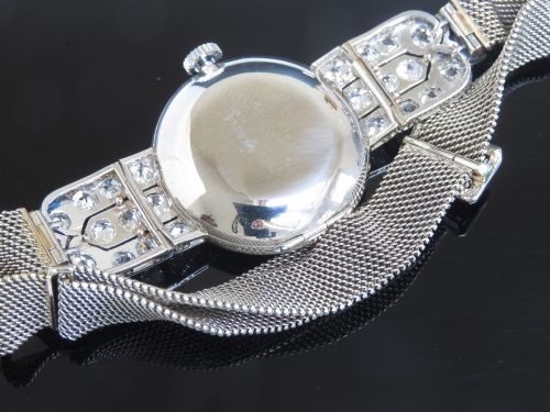 fig 6. INCREDIBLE LONGINES PLATINUM AND 5CTS OF DIAMONDS ART DECO LADIES COCKTAIL WATCH RETAILED BY HARRODS OF LONDON C1940