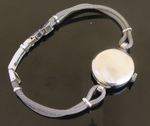 fig 5. BEAUTIFUL UNIVERSAL GENEVE PLATINUM AND DIAMOND LADIES COCKTAIL WATCH C1950