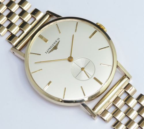 fig 2. .SOLID 9CT GOLD LONGINES CALIBRE 19.4 ON A SOLID 9CT GOLD BRACELET MENS VINTAGE WATCH C1960