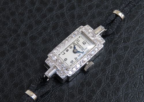 fig 2. Universal Geneve Platinum and Diamond Watch retailed by Collingwood The Crown Jewellers