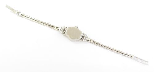 fig 6. Platinum and Diamond Art Deco Cocktail Watch by Vertex c1954