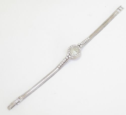 fig 2. Solid 18ct White Gold and Diamond Omega Ladies Cocktail Watch c1951