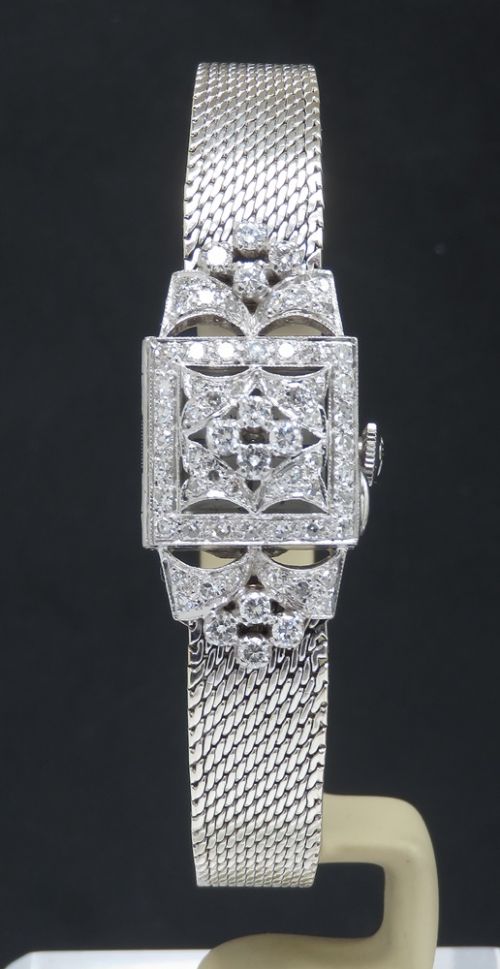 fig 1. Incredible and Rare Platinum and Diamond 'Hooded' ladies Cocktail Watch c1967 by Vertex