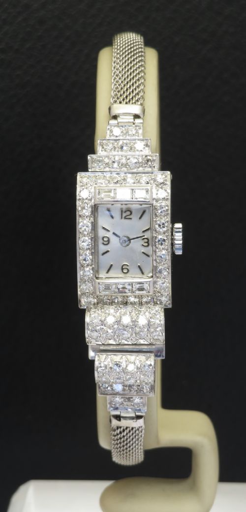 Spectacular and Rare Platinum and Diamond Art Deco Asymmetrical "Wave" Ladies Cocktail Watch C1930