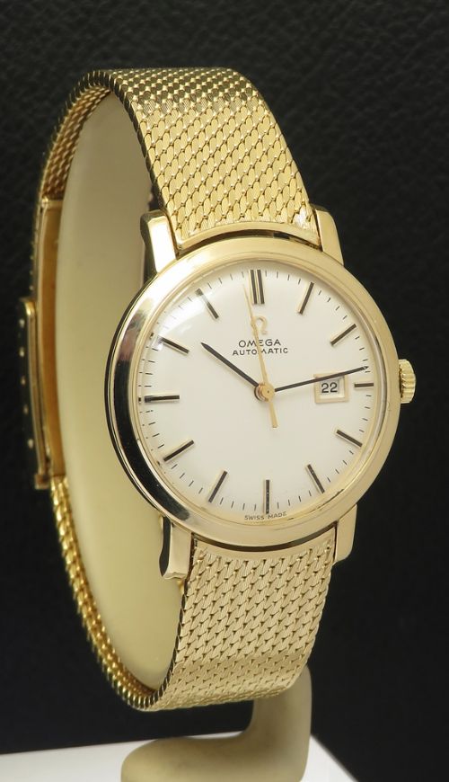 fig 1. Mint solid 18ct gold midsize Omega automatic 1962 box and papers