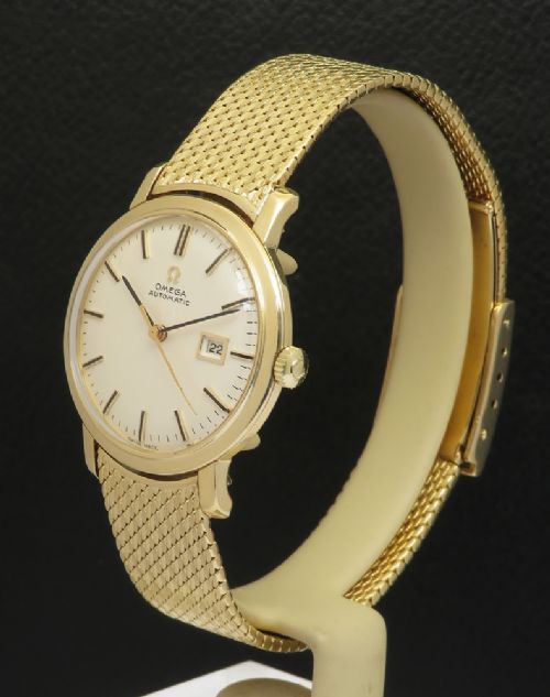 fig 2. Mint solid 18ct gold midsize Omega automatic 1962 box and papers