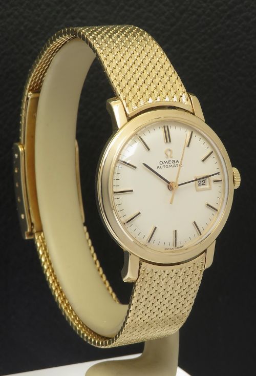 fig 3. Mint solid 18ct gold midsize Omega automatic 1962 box and papers