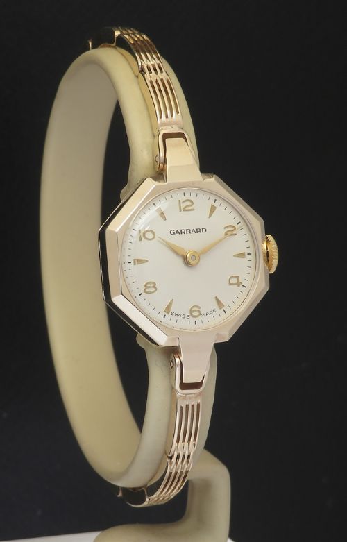fig 4. Mint solid 9ct gold Art Deco ladies watch by Garrard 'The Crown Jewellers' with box and papers 1961