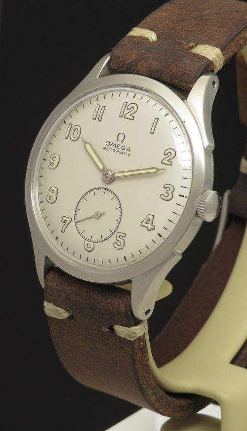 fig 1. Early Omega Military Style Automatic Bumper c1944