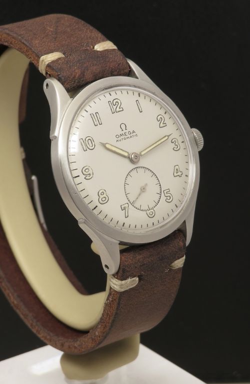 fig 3. Early Omega Military Style Automatic Bumper c1944