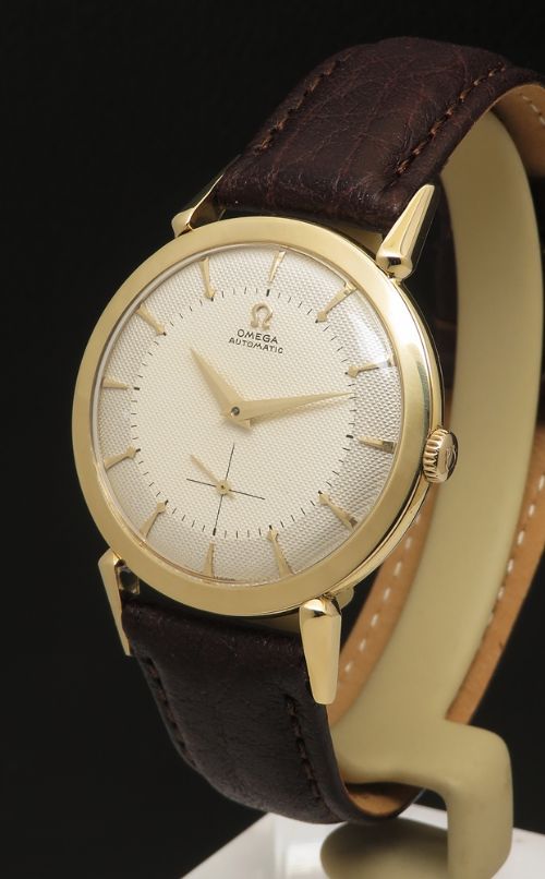 fig 1. Very Rare 18ct Gold Omega Bumper Automatic with shooting star dial c1953