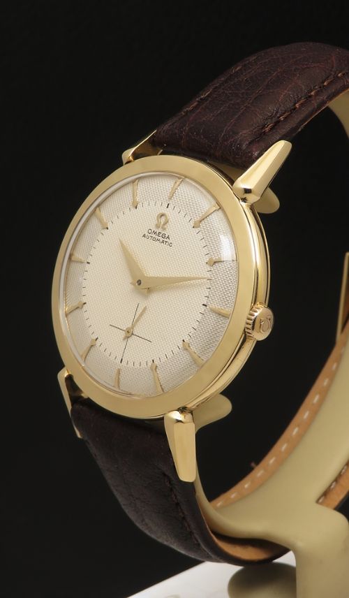 fig 2. Very Rare 18ct Gold Omega Bumper Automatic with shooting star dial c1953