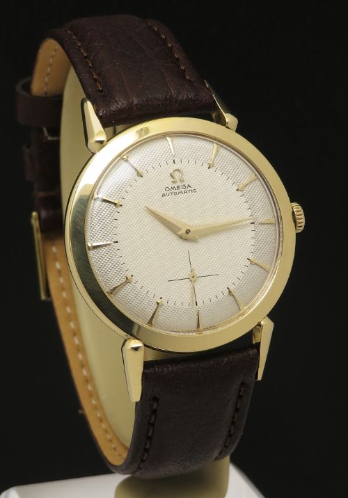 fig 3. Very Rare 18ct Gold Omega Bumper Automatic with shooting star dial c1953