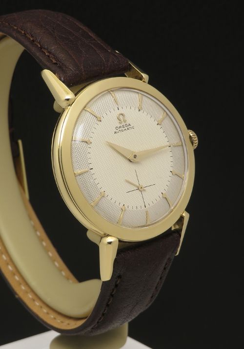 fig 4. Very Rare 18ct Gold Omega Bumper Automatic with shooting star dial c1953
