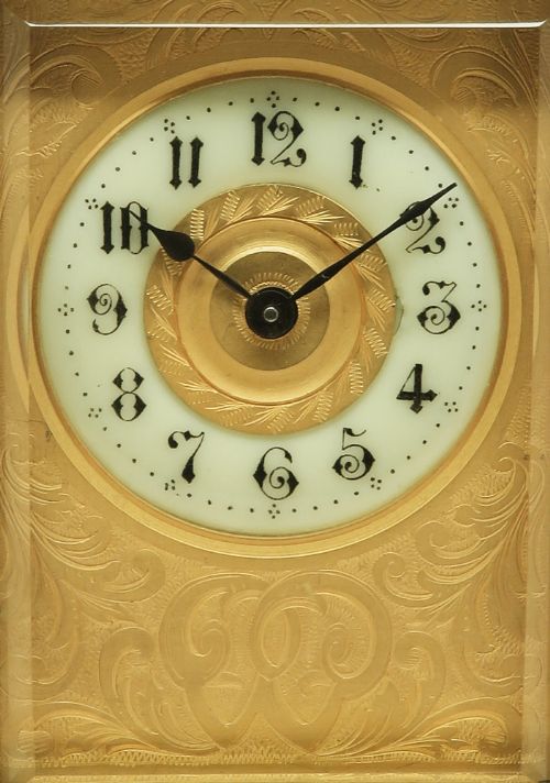 fig 3. A Fine Victorian gilt masked Carriage Clock c1880
