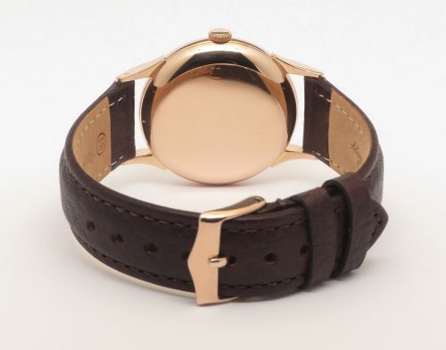 fig 4. Very Rare 18ct Rose Gold Omega Bumper with Spider Leg Case 1951
