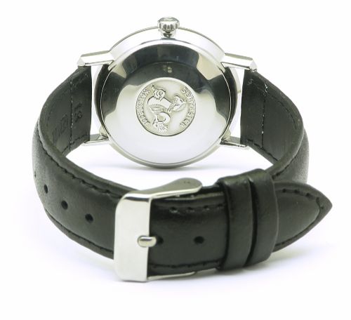 A vintage Omega Seamaster DeVille wristwatch featuring a round stainless steel case, a black dial with silver baton hour markers, and a stitched black leather strap. View VI