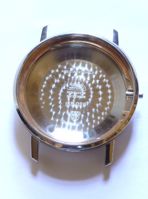 A vintage Omega Seamaster DeVille wristwatch featuring a round stainless steel case, a black dial with silver baton hour markers, and a stitched black leather strap. View VIII