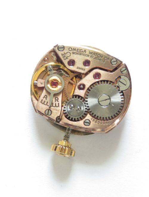 A 1961 ladies Omega wristwatch made from solid 9ct gold featuring a round dial with baton markers and an integrated brick-link gold bracelet. View VIII